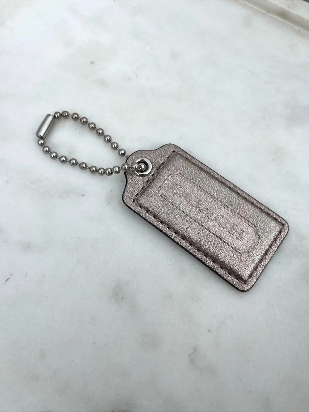 COACH Vintage Metallic Leather Hang Tag, Silver Gold
